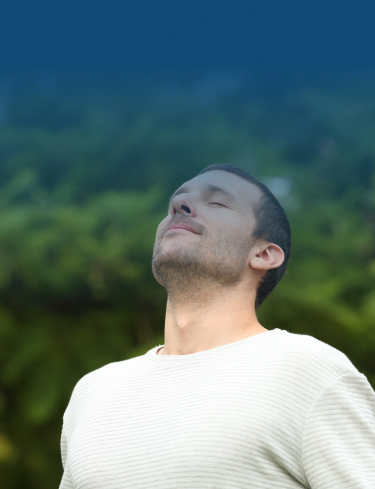 A Man With Closed Eyes Looks Upward, Expressing Contemplation