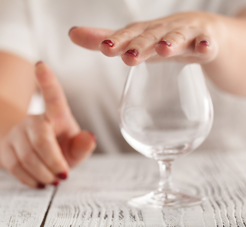 A Woman Glass Of White Wine, Enjoying A Moment Of Relaxation