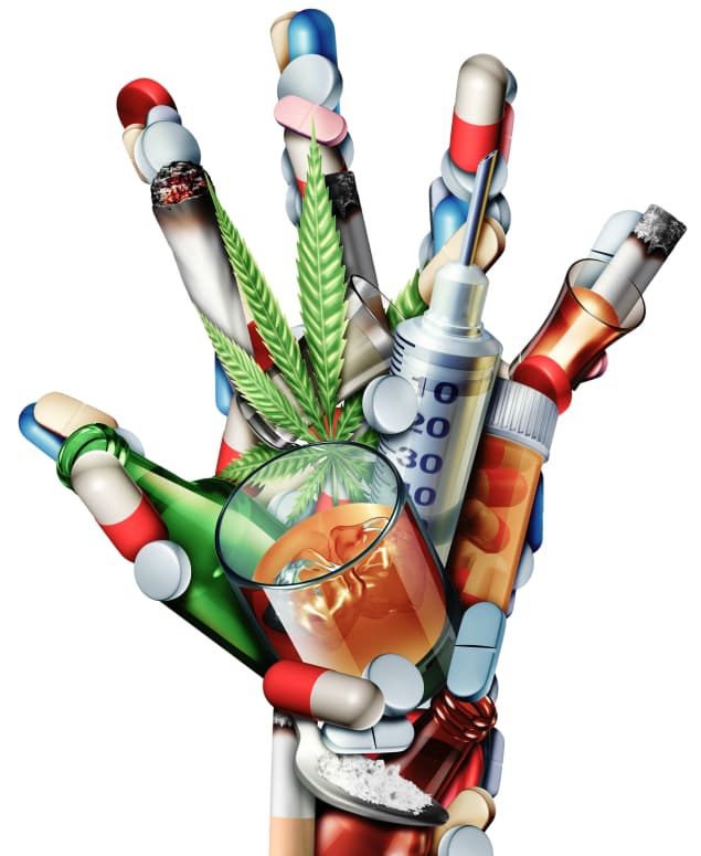 A Hand Holding Pills, A Drink, And Marijuana On A Flat Surface