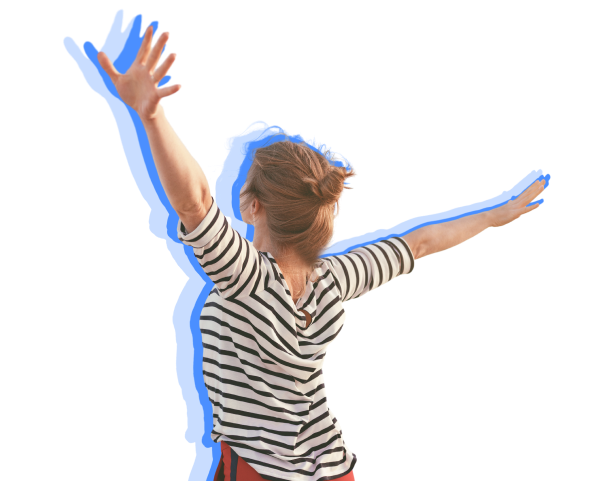 A Woman In A Striped Shirt Raises Her Arms In Celebration
