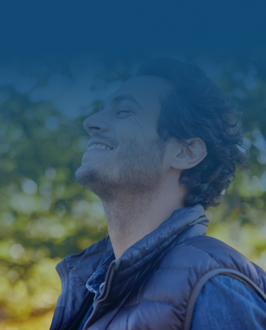 A Man Stands Against A Blue Background With The Text, &Quot;The Best Way To Get A Good Night'S Sleep&Quot;