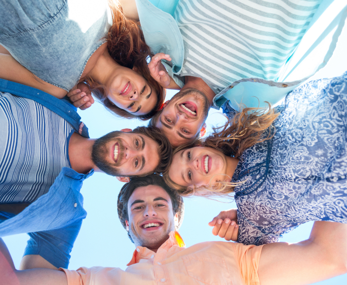 Friends Standing In A Circle.